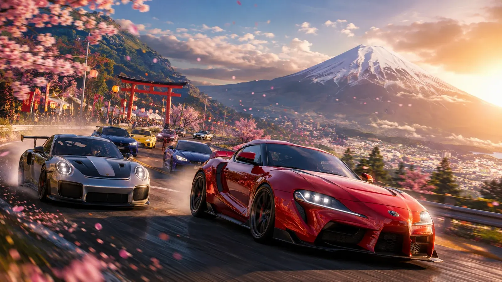 High-performance cars on a mountain road with Mount Fuji behind