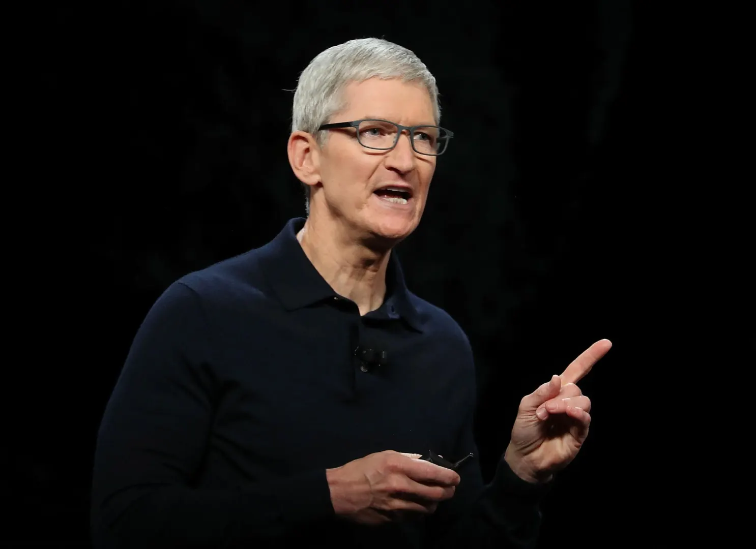 Tim Cook speaking at an Apple keynote before the leadership transition